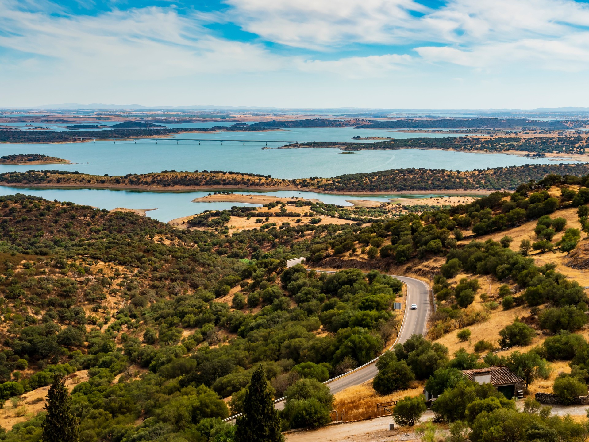 Wonderful landscape with rolling hills and Alqueva lake in background, Monsaraz, Portugal